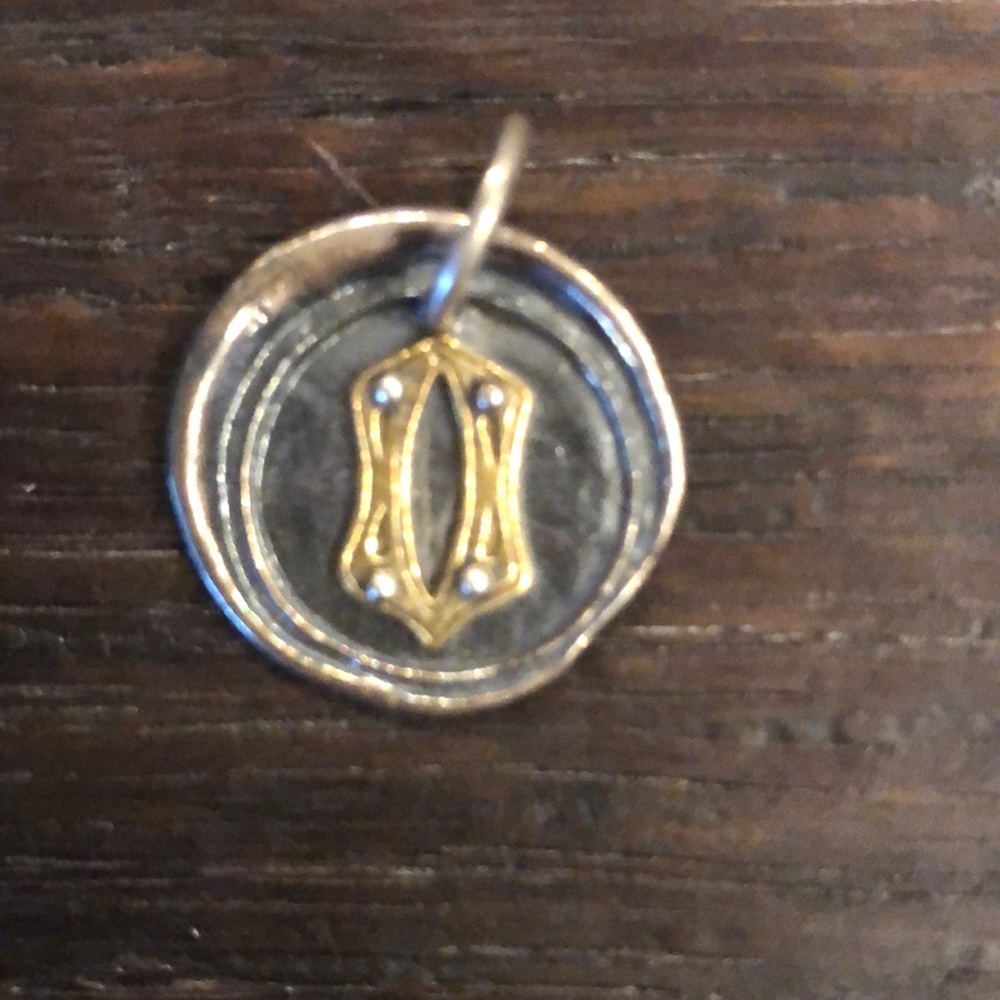 Letter “O” Rivet Insignia Charm Waxing Poetic
